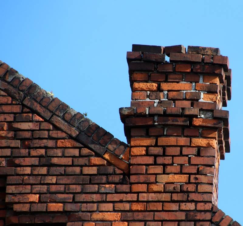 Signs Your Villa Park Home Needs a Chimney Inspection Damaged chimney on an Villa Park home showing cracks and missing mortar